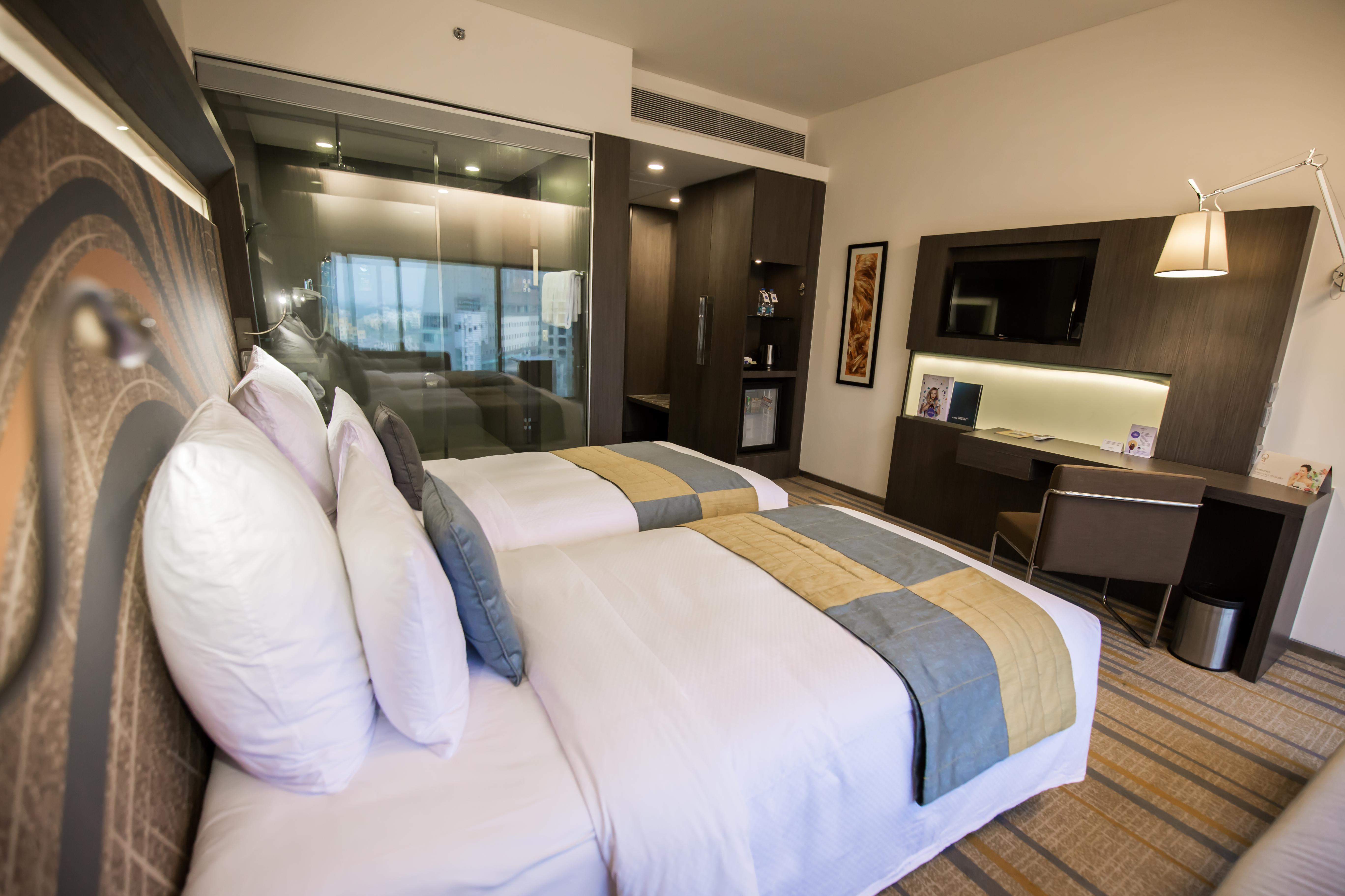 Novotel Kolkata Hotel And Residences Calcutá Exterior foto A room at the hotel